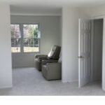 Freshly painted living room with clean white walls and trim by Michael’s Painting in Philadelphia.