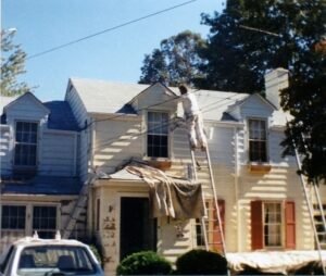 Professional painter from Michael’s Painting working on the exterior of a Philadelphia home.
