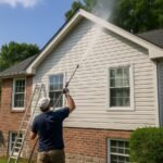 Pressure washing a suburban home in Bucks County, PA.